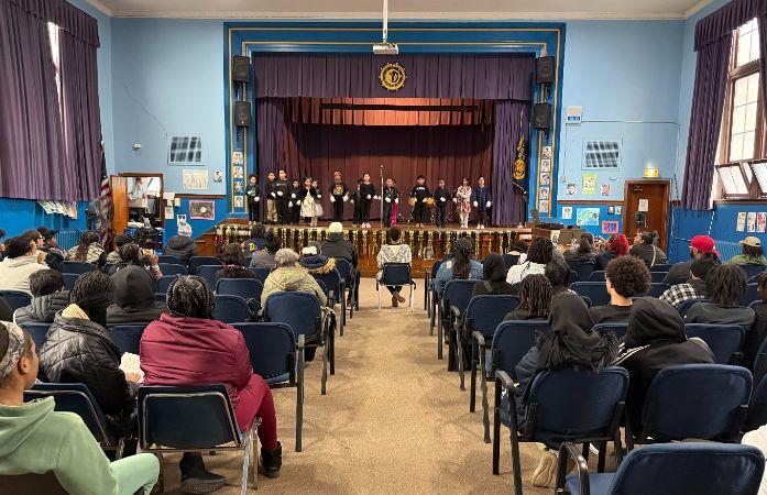  Students performing at holiday program.